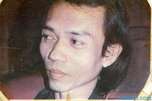 Nhac si 'Co be co chiec rang khenh' qua doi hinh anh