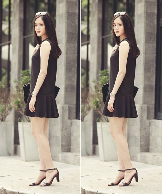 Á hậu Hoàng Anh tự tin khoe dáng thanh mảnh với váy hạ eo màu đen kết hợp phụ kiện cùng màu sang trọng và quyền quý.