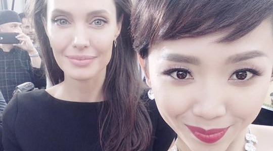 Toc Tien khoe anh chup cung Angelina Jolie hinh anh