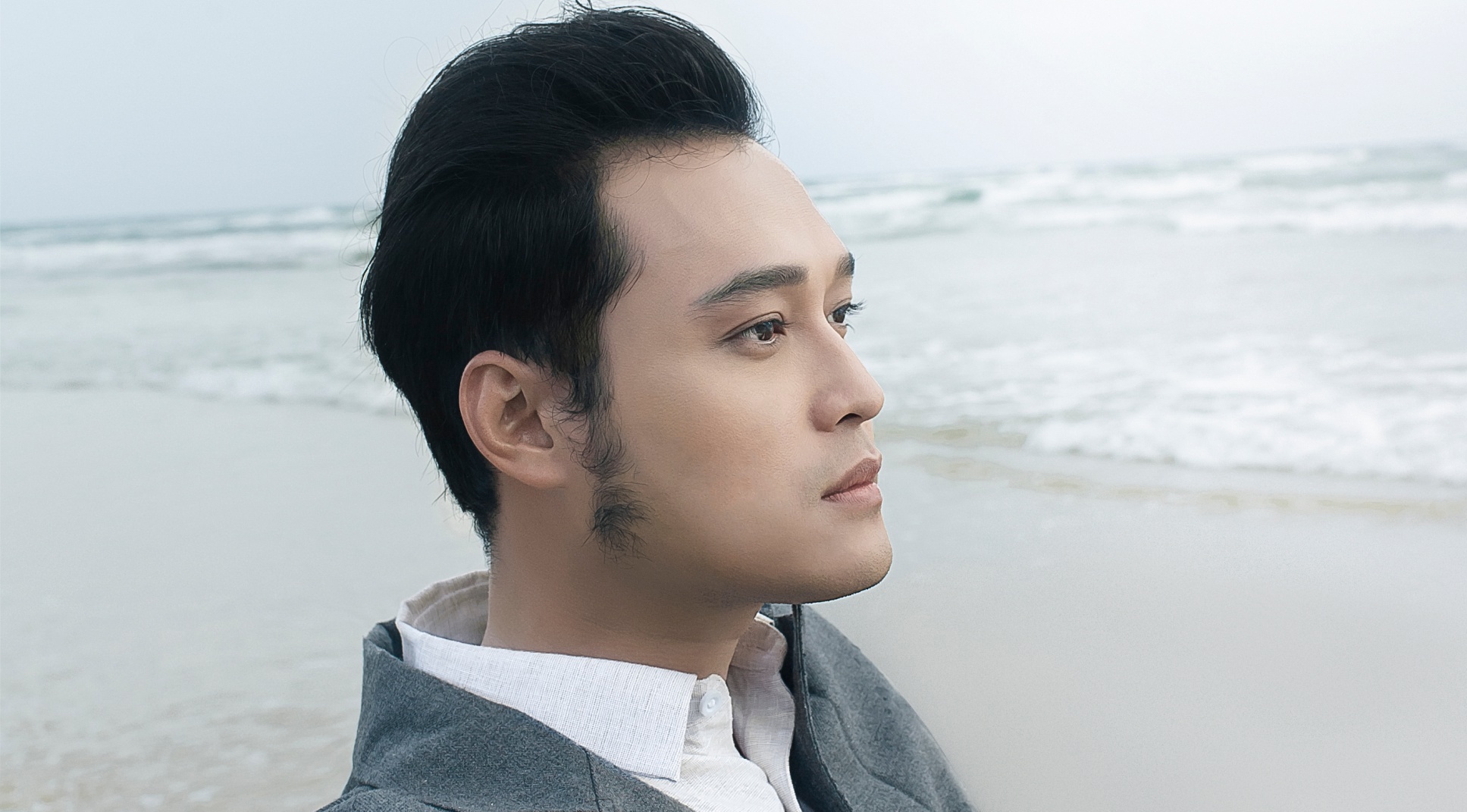 Quang Vinh lang tu ben bo bien trong MV moi hinh anh