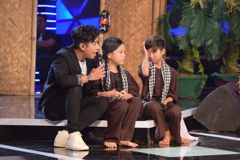 Duc Vinh - Quynh Anh hat Sa mua giong hinh anh