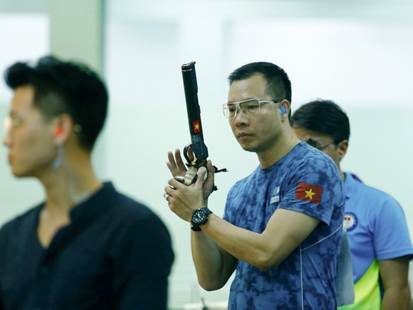 Olympic gach ten noi dung tung giup Hoang Xuan Vinh gianh huy chuong hinh anh