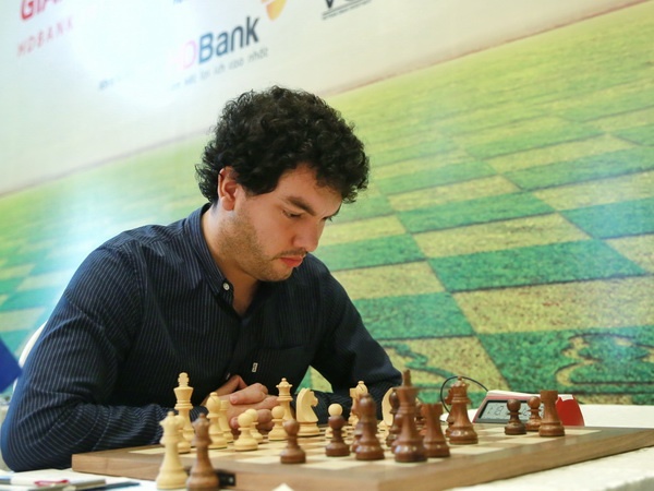 Quang Liem dung thu sau o giai co quoc te tren san nha hinh anh