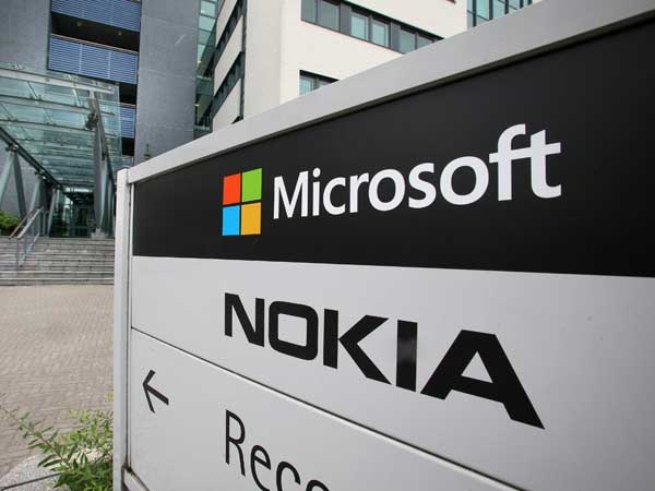 Microsoft thua lo sau thuong vu mua lai Nokia hinh anh