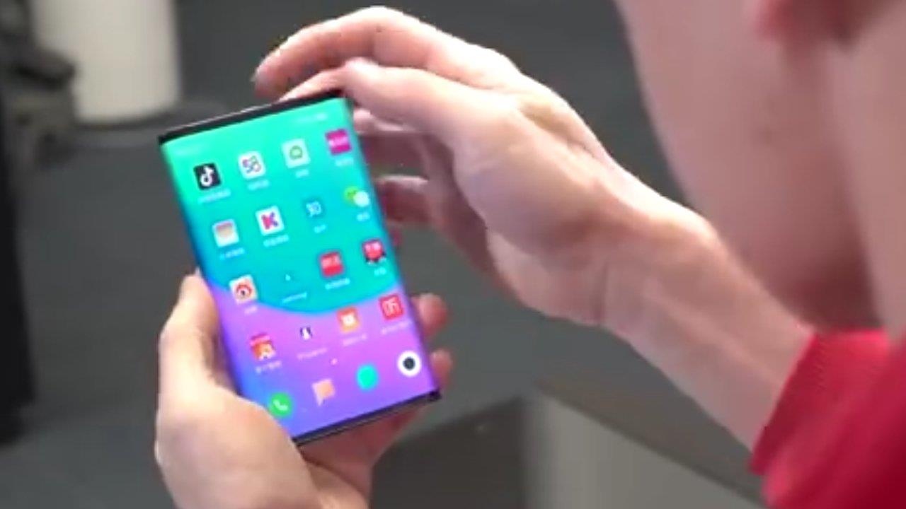 Teaser moi ve chiec dien thoai gap cua Xiaomi. hinh anh