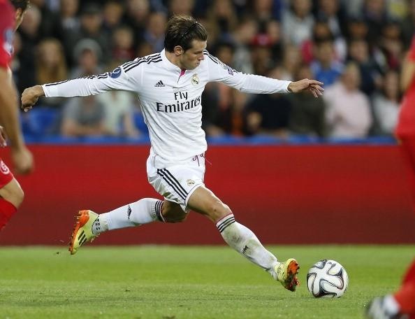 Gareth Bale the hien phong do tuyet voi o mua he 2014 hinh anh