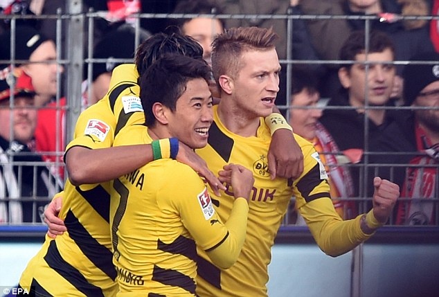 Phot lo Real va Arsenal, Marco Reus dong y o lai Dortmund hinh anh