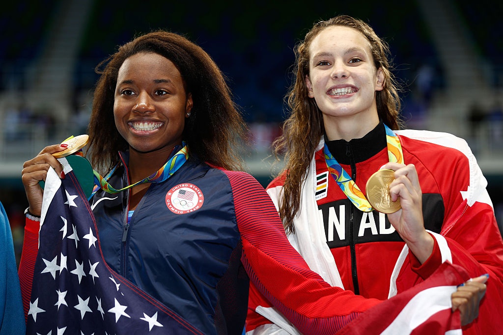 VDV 16 tuoi gianh HCV, lap ky luc 100 m tu do nu Olympic hinh anh