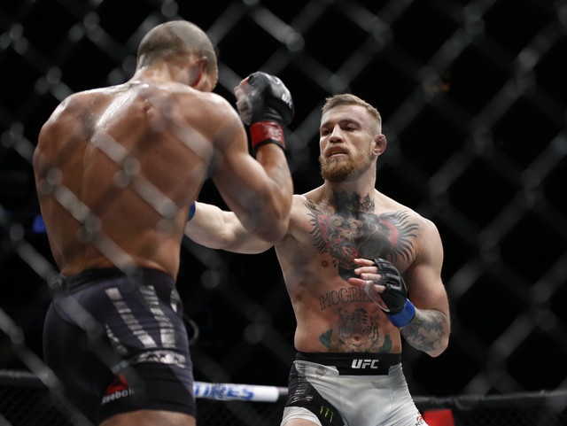 ‘gã điên’ McGregor đi vào lịch sử UFC ảnh 3 ‘ga dien’ McGregor di vao lich su UFC anh 3