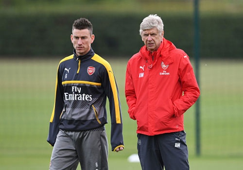 Wenger lo khi Arsenal co the het co hoi duoi kip MU hinh anh