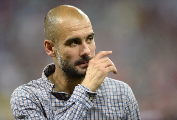 Guardiola khong dam nhan la HLV gioi nhat the gioi hinh anh