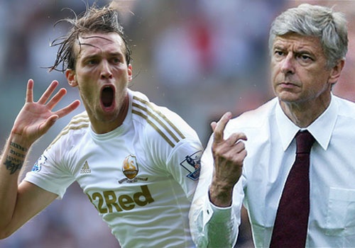 Be tac trong vu Suarez, Arsenal chuyen sang Michu hinh anh