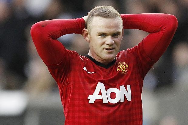 Fan M.U 'nem da' Rooney sau hop dong beo bo hinh anh
