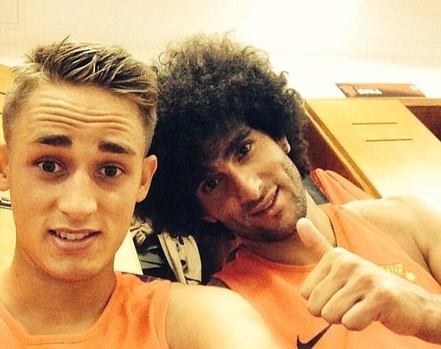 Ban hop dong ho Fellaini sap khan goi roi M.U hinh anh