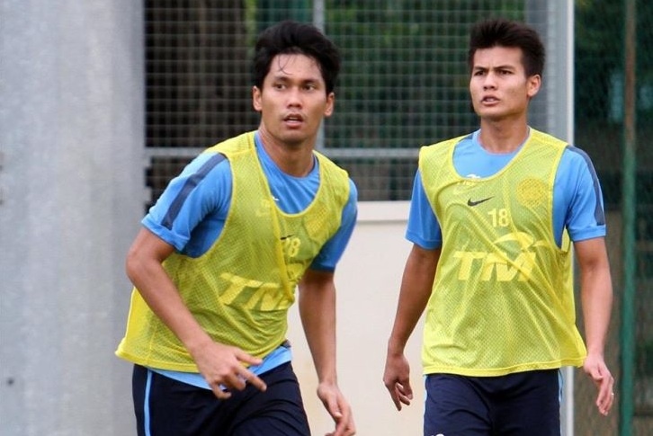 Published: Wednesday December 3, 2014 MYT 9:27:00 PM Updated: Wednesday December 3, 2014 MYT 11:12:46 PM Be more vocal on the pitch, says Dollah by eric samuel Dollah wants his players to improve communication on and off the field. -ROHAIZAT DARUS/The Star Dollah wants his players to improve communication on and off the field. -ROHAIZAT DARUS/The Star PETALING JAYA: Speak up, guys! National coach Dollah Salleh wants his players to start talking on the pitch as they prepare for the AFF Suzuki Cup semi-final clash against Vietnam on Sunday . “I don’t see much communication among the players ... be it in training or in competition. They must be able to speak and share information and play as a unit. Communication is an important tool in any team sport ... without it there is no organisation,” said Dollah. That’s why the former international wants the players to be more vocal on the pitch. “I’ve always stressed on the importance of communication during my briefing sessions. It’s top on my list besides talking about strategies and other aspects of the game. It is simple ... better communication leads to better understanding. “For example, the goalkeeper will have half his workload cut out if he communicates well with his backline.” Dollah said that skipper “Mohd Shukor Adan is the only one in the heart of defence who gives out instruction to the players”. “Now that Shukor is suspended (for the next game) I hope the others will take the lead to get the team moving, especially the seniors,” said Dollah. Shukor and striker Mohd Amri Yahyah will have no part to play when the national team face Vietnam on Sunday. The duo will serve out a one-match suspension each. Mohd Fadhli Shas (left) and Mohd Muslim Ahmad