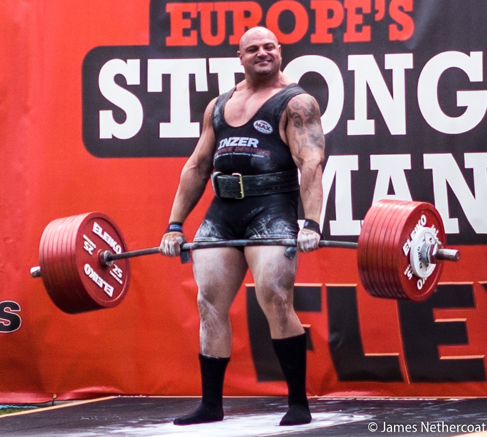 Shahlaei sinh tại Swindon, Anh. Lực sĩ 32 tuổi từng là người đàn ông khỏe nhất Vương quốc Anh năm 2012 và 2013. Tại cuộc thi Người đàn ông khỏe nhất thế giới 2014, Shahlaei đứng thứ 10 với 25,5 điểm.