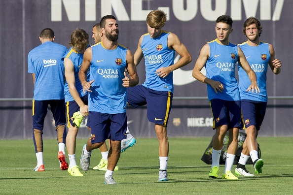 Arda Turan hoi quan cung Barca de chuan bi cho mua giai moi hinh anh