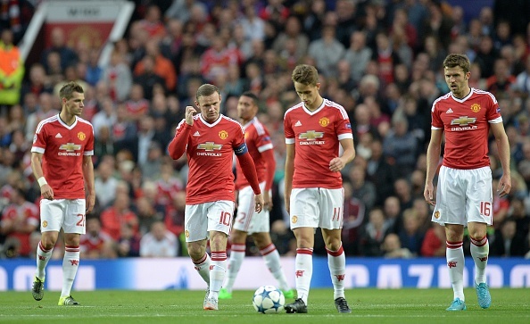 Nỗi thất vọng của cầu thủ M.U sau cú đá phản lưới của Michael Carrick. Ảnh: Getty Images.