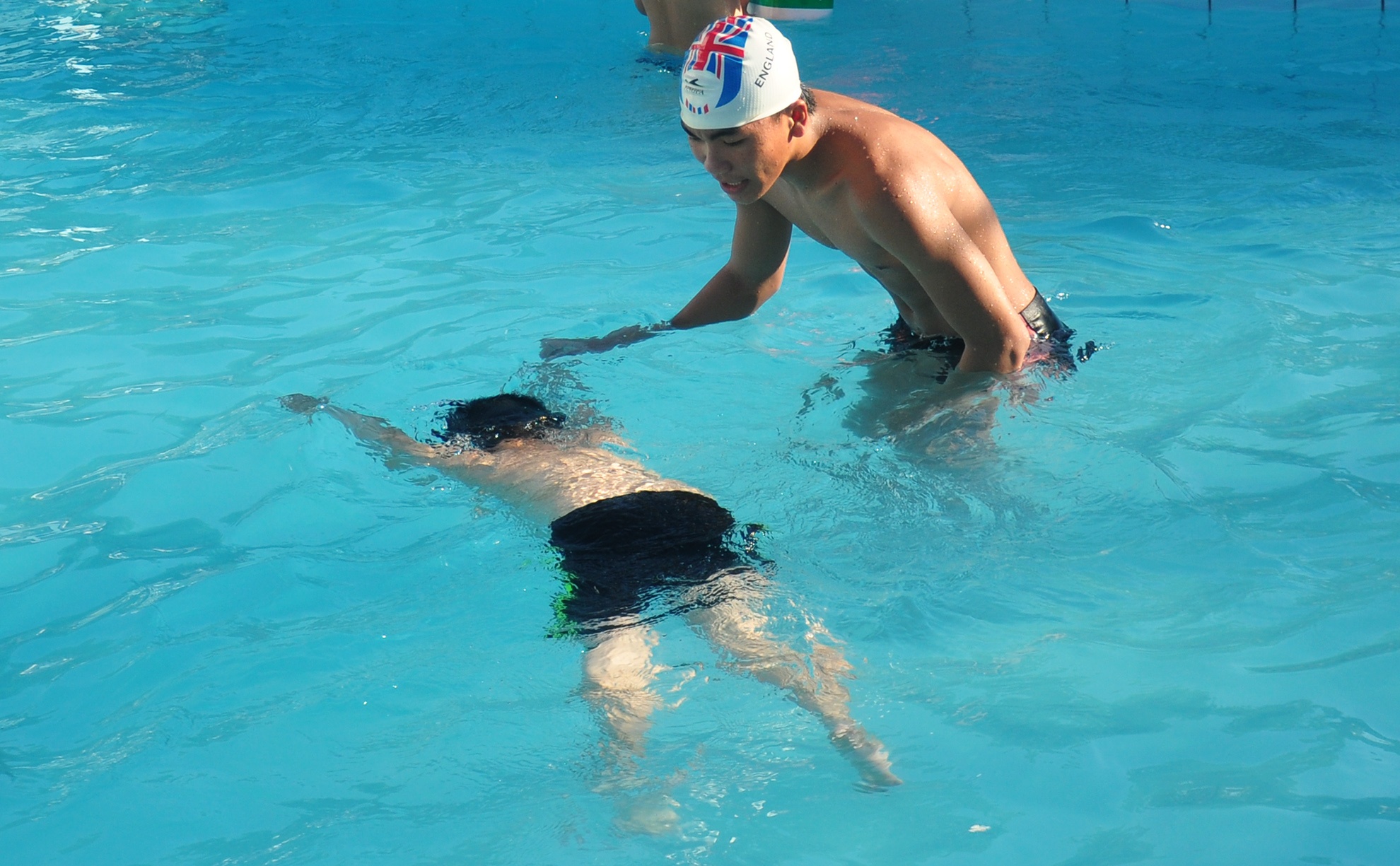 Phu huynh cho con hoc boi anh 9