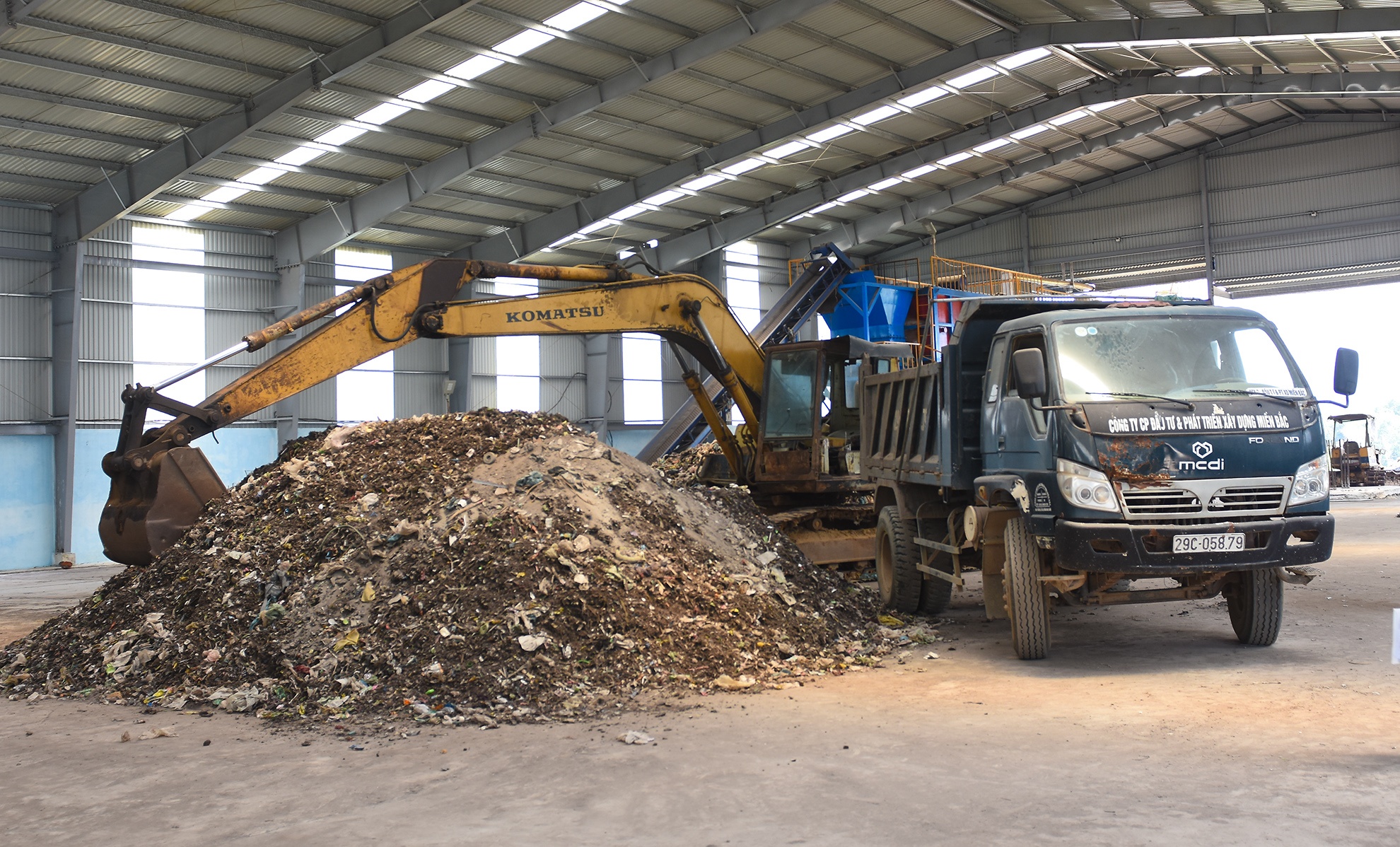 Nha may rac cham tien do anh 11