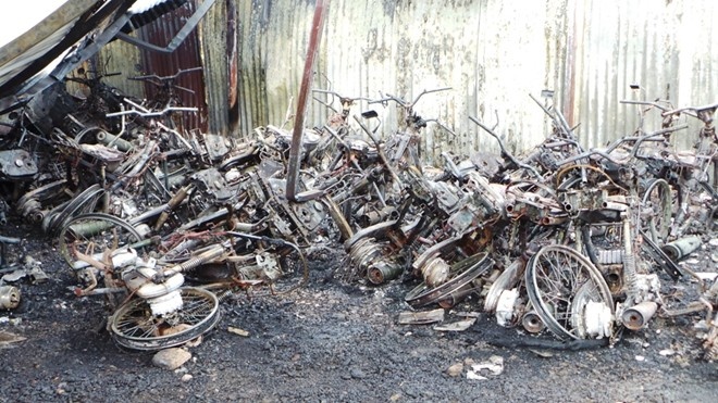 Truy tim nguoi dot rac lam chay hon 300 xe may o Sai Gon hinh anh