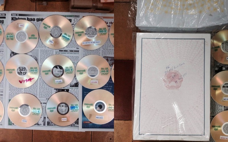 Hàng loạt đĩa lưu trữ các mẫu hồ sơ, thị thực làm visa của các nước công an thu giữ được của 2 tên