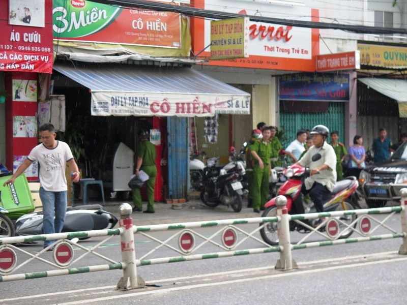Con trai chu tiem tap hoa dam chet nguoi tiep thi keo hinh anh