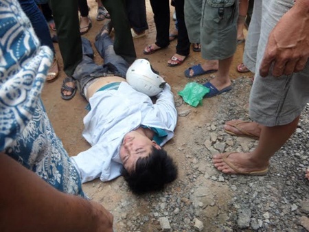 Cuop tiem vang, nam thanh nien bi nguoi dan danh bat tinh hinh anh