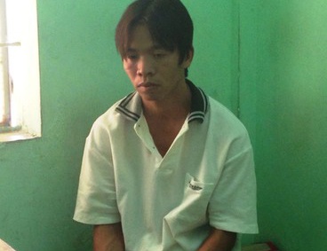 Nam thanh niên giết đồng nghiệp bị công an bắt giữ. Ảnh: Khánh Trung.