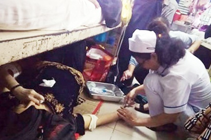 Dieu duong cap cuu benh nhan duoi san nha bi ky luat hinh anh