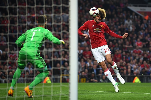 Cham diem MU 1-1 Celta Vigo: Ngoi sao Fellaini va toi do Bailly hinh anh