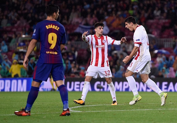 Messi toa sang giup 10 nguoi Barca danh bai Olympiacos anh 10