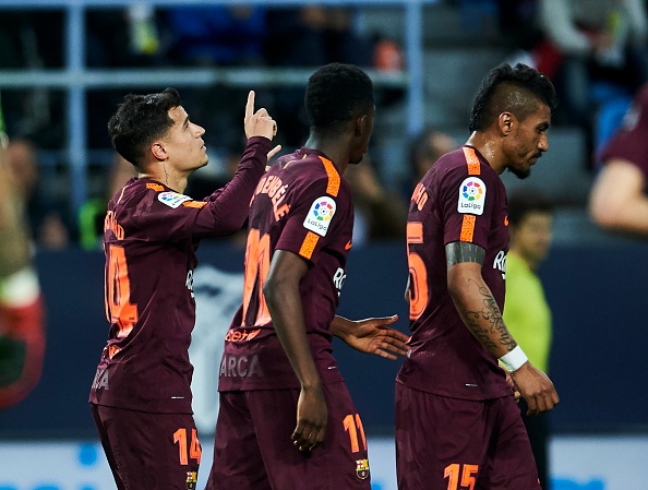 Vang Messi,  Barca bay tren doi canh cua Suarez va Coutinho anh 4