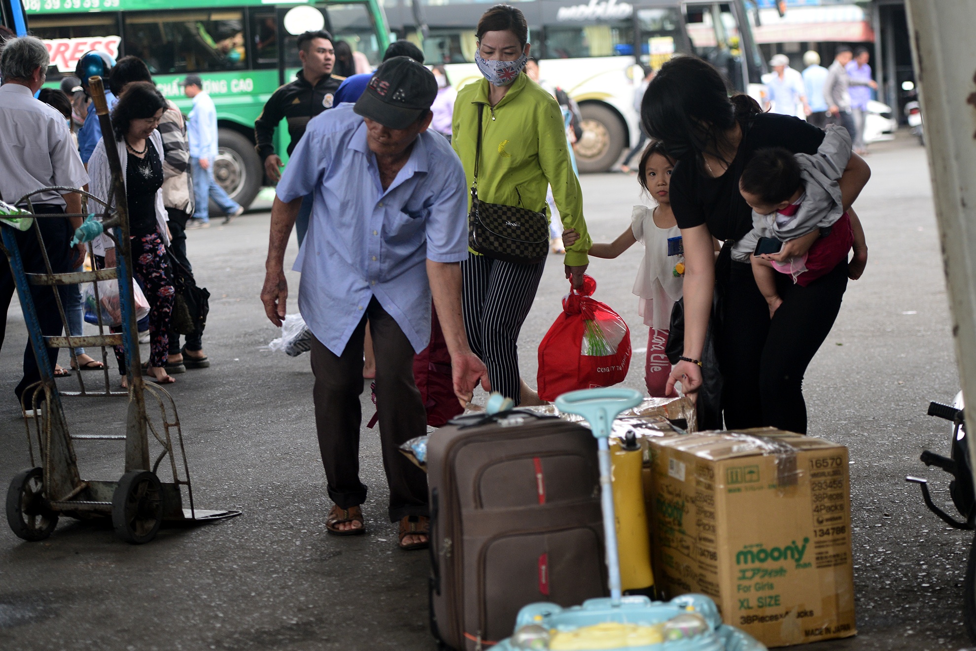 nguoi dan tro lai Sai Gon sau Tet anh 12