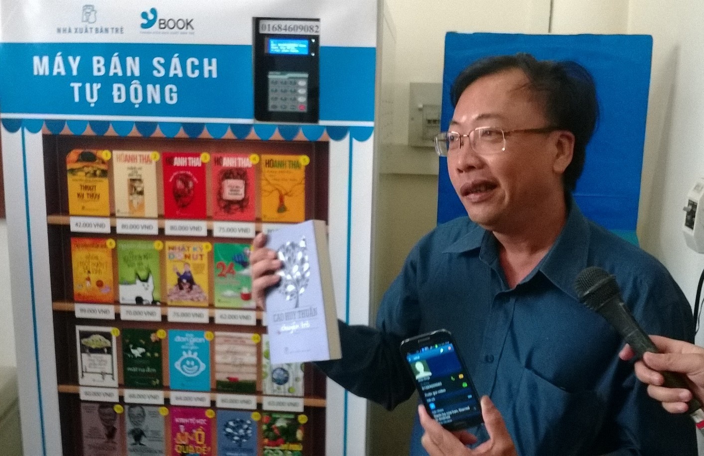 NXB Tre thu nghiem may ban sach tu dong hinh anh