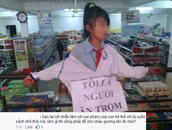 Khoi to vu bat nu sinh deo bang ‘toi la nguoi an trom’ hinh anh
