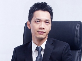 Ông Trần Hùng Huy.