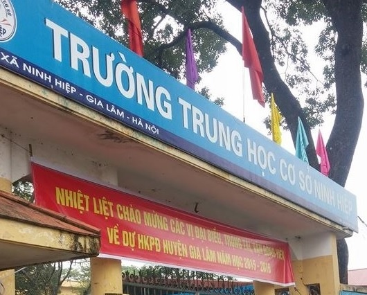 Nhan tin den tung phu huynh moi 2.000 hoc sinh den truong hinh anh