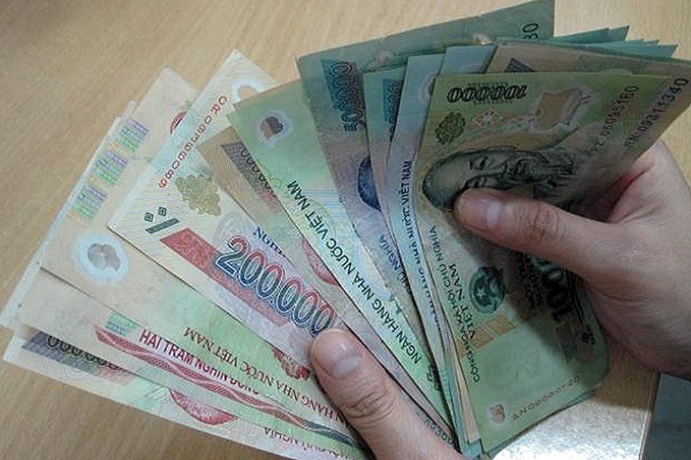 Ban khoan chuyen thuong Tet giao vien hinh anh