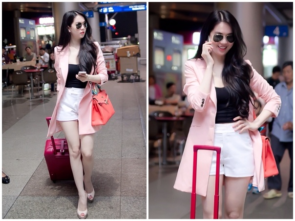 Ngoc Trinh dien shorts ngan sanh dieu o san bay hinh anh