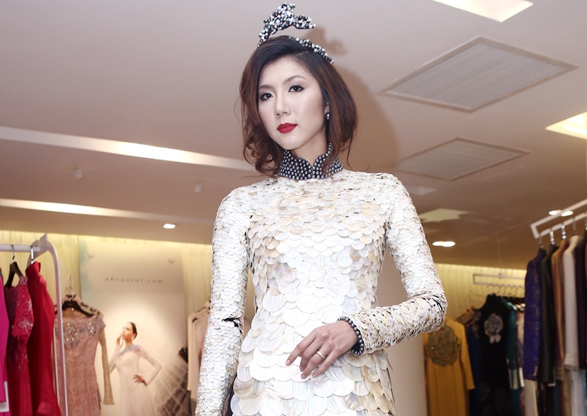Ngoc Quyen mac ao dai vo trai nang hon 10 kg hinh anh