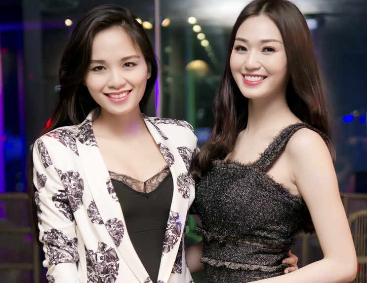 Diem Huong kheo giau bung bau 5 thang voi ao vest rong hinh anh