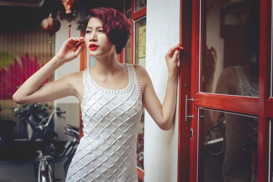 Trang Tran dao pho voi 3 kieu trang phuc sexy hinh anh