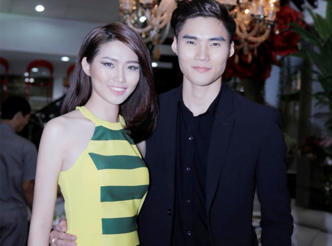 Quang Hung Next Top Model om eo ban gai tinh tu di tiec hinh anh