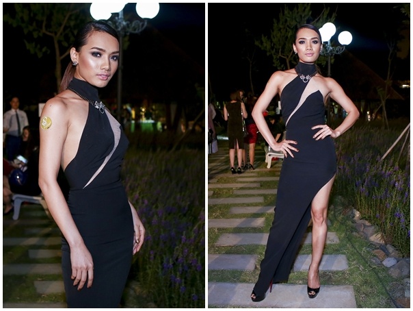Bắt nhịp xu hướng thời trang tối màu, người mẫu Ngọc Quý khoe vóc dáng cân đối trong bộ đầm bó sát, cắt xẻ bất đối xứng phá cách.
