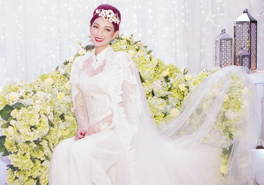 Quynh Chi mac vay cuoi sau on ao ly hon hinh anh