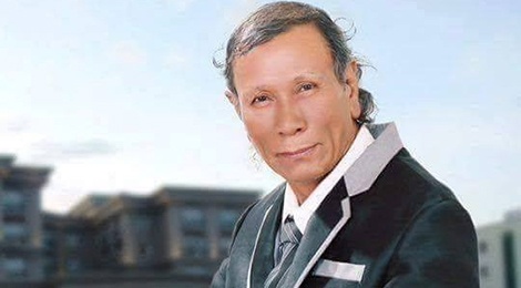 Nghe si Quoc Bao va nhac si Kong Thanh Bich qua doi hinh anh