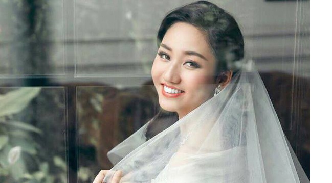 A hau Tra My bo thi Hoa hau Hoan vu 2016 vi len xe hoa hinh anh