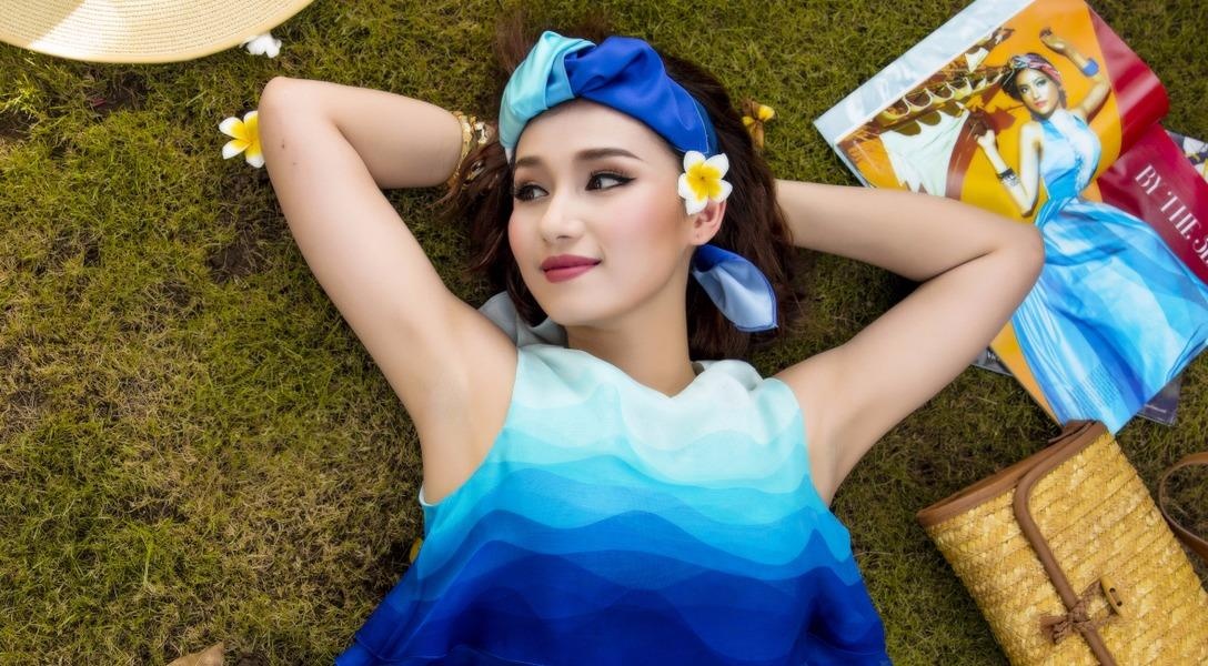 La Thanh Huyen mat mat voi dam trang xanh trong ngay nang hinh anh