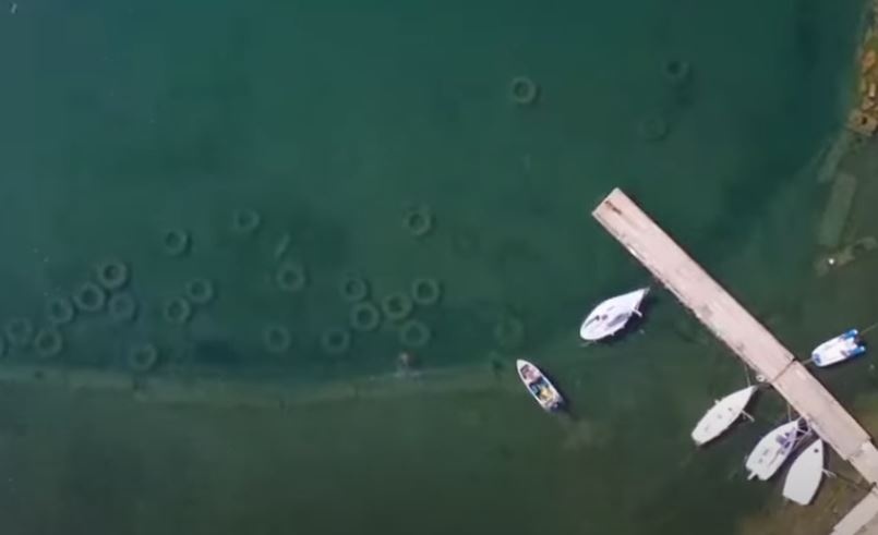 Hon 100 chiec lop xe duoc tim thay o ho Turgoyak, Nga hinh anh